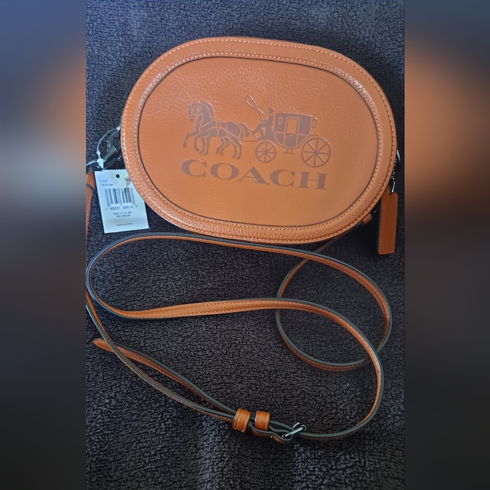 Coach camera bag with horse and buggy